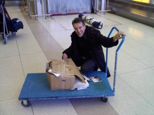 Thanks West Jet Busted box of CDs upon return (Winnipeg Airport) See what happens when you don't buy at concerts? Eh?!!